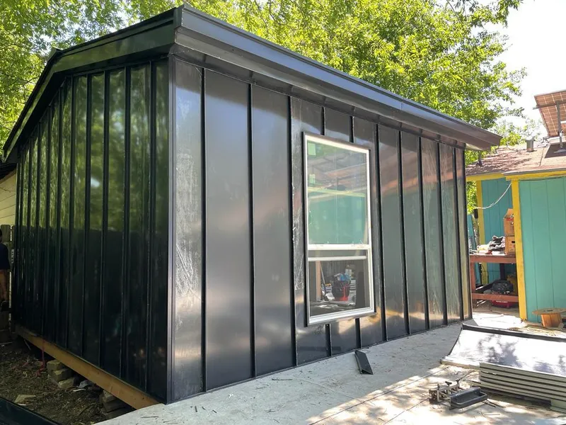 Black standing seam metal wall panels for Roof Inspection in Grand Rapids