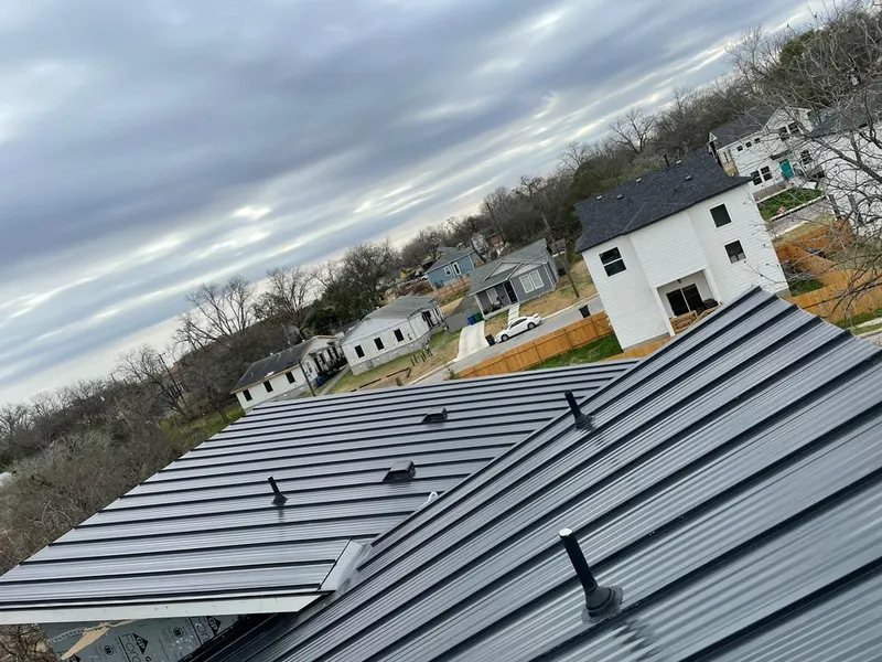 Standing seam metal roof panels with vents for Skylight Repair in Grand Rapids